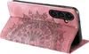 A pink phone case with a mandala design is shown. Produktbild-Vorschau