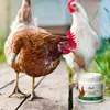 Two chickens are on a wooden walkway with a product container in the foreground. Produktbild-Vorschau