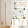 A white cabinet is shown, with a diagram illustrating anti-tip safety features. The background is a room with a window and plants. Produktbild-Vorschau