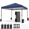 A blue pop-up canopy tent with its frame, carrying bags, sandbags, and stakes laid out on a white background. Produktbild-Vorschau