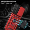 A red and black phone case with a ring holder is shown attached to a car air vent via a magnetic mount. Produktbild-Vorschau