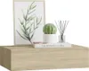 A floating shelf with decorative items on top. Produktbild-Vorschau