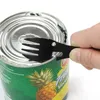 A hand is using a black multi-tool to open a can of sliced pineapple. Produktbild-Vorschau