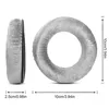 Two ear pads for headphones are shown, one in profile and one from the front, with dimensions indicated. Produktbild-Vorschau