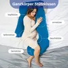 A pregnant woman is lying on a bed, using a large U-shaped pillow for support. Náhľad obrázku produktu