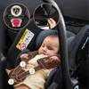 A baby sleeping in a car seat with safety features highlighted. Náhľad obrázku produktu