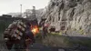 A character in a video game is shown in a combat scenario, firing a weapon. Produktbild-Vorschau