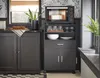 A kitchen scene with a microwave cart, cabinets, and a window. Anteprima dell’immagine prodotto
