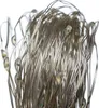 A close-up view of a tangled string of LED lights with a silver wire and clear bulbs. Náhľad obrázku produktu