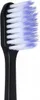 A close-up shot of the head of a black toothbrush with white and purple bristles. Náhled obrázku produktu
