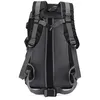The back view of a black and gray backpack. Produktbild-Vorschau