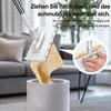 A mop being used to dispose of a dirty cleaning cloth into a bin, with a close-up inset showing how to detach the cloth. Produktbild-Vorschau