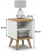 A bedside table with a lamp and books on it, with dimensions indicated. Náhled obrázku produktu