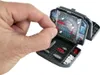 A hand is placing a red peg into a miniature battleship game board. Produktbild-Vorschau