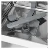Close-up view of the interior of a dishwasher, focusing on the spray arm and filter system. Voir les images du produit