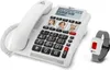 A white corded emergency telephone with a digital display and speed dial buttons, accompanied by a white and gray SOS wristband. Náhľad obrázku produktu