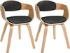 Two modern dining chairs with black seats and curved wooden frames. Náhled obrázku produktu