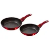 Two red frying pans with black speckled interiors and red handles are shown against a white background. Podgląd zdjęcia produktu