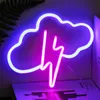 A neon sign shaped like a cloud with a lightning bolt inside, lit up with blue and pink lights. Náhled obrázku produktu