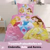 A close-up view of Disney Princess themed bedding, including a duvet cover and pillowcase, displayed on a bed in a child's room. Produktbild-Vorschau