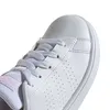 A close-up view of the toe area of a white Adidas sneaker with pink accents. Podgląd zdjęcia produktu
