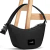 A black Pacsafe handbag is displayed against a light wooden structure. Anteprima dell’immagine prodotto
