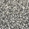 A close-up view of small, mixed-color gravel or stones. Náhľad obrázku produktu