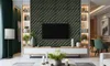 A modern living room with a TV mounted on a wall with decorative panels, a media console, and shelves with decor items. Produktbild-Vorschau