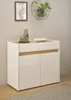 A white and wood-tone cabinet with decorative items on top, placed against a light gray wall. Produktbild-Vorschau