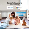 A family is interacting with a smart home device, with text overlays indicating voice control features. Produktbild-Vorschau