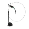A cat toy with a bird attached to a wire, mounted on a suction cup base. Voir les images du produit