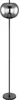 A floor lamp with a dark metal base and stem, and a reflective, oval-shaped shade. Produktbild-Vorschau