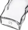 A close-up view of the bottom of a clear glass bottle, showing embossed markings. Produktbild-Vorschau