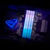 Close-up of computer RAM modules and a CPU cooler with RGB lighting. Anteprima dell’immagine prodotto