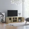 A modern living room with a TV stand, TV, artwork, and a chair. Náhled obrázku produktu