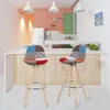 A modern kitchen with a breakfast bar and two colorful bar stools. Produktbild-Vorschau