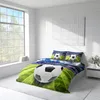 A bedroom with a bed dressed in soccer-themed bedding, featuring a large soccer ball design. Produktbild-Vorschau