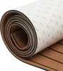 A rolled-up piece of faux teak flooring with a white backing that has the 3M logo printed on it. Podgląd zdjęcia produktu