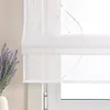 A close-up view of a white sheer Roman blind with decorative beaded strings, next to a vase of lavender. Produktbild-Vorschau