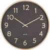 A close-up view of a wall clock with a dark gray face and a light wood frame. Anteprima dell’immagine prodotto