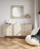 A bedroom scene with a dresser, mirror, lamp, and chair. Produktbild-Vorschau