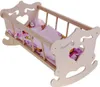 A wooden doll's cradle with bedding. Náhľad obrázku produktu