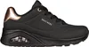 A side view of a black Skechers sneaker with rose gold accents. Voir les images du produit