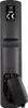 The back of a black remote control with the battery compartment open. Produktbild-Vorschau