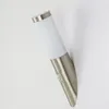 A modern wall lamp with a motion sensor is mounted on a white wall. Produktbild-Vorschau