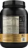 The back of a black and gold tub of Optimum Nutrition Gold Standard Isolate protein powder, showing nutritional information and ingredients. Produktbild-Vorschau