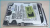 A hard disk drive is shown from a diagonal angle on a light gray background. Produktbild-Vorschau