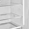 Close-up view of the interior of a refrigerator, showing shelves and vents. Produktbild-Vorschau