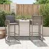 Two bar stools and a bar counter are set up on a patio. Produktbild-Vorschau