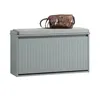 A grey shoe cabinet with a grey seat cushion and a brown handbag on top, isolated on a white background. Náhled obrázku produktu